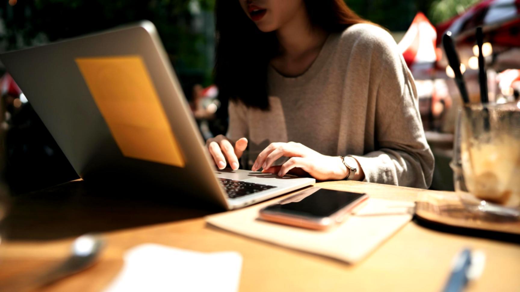 Professional reviewing financial reports and data